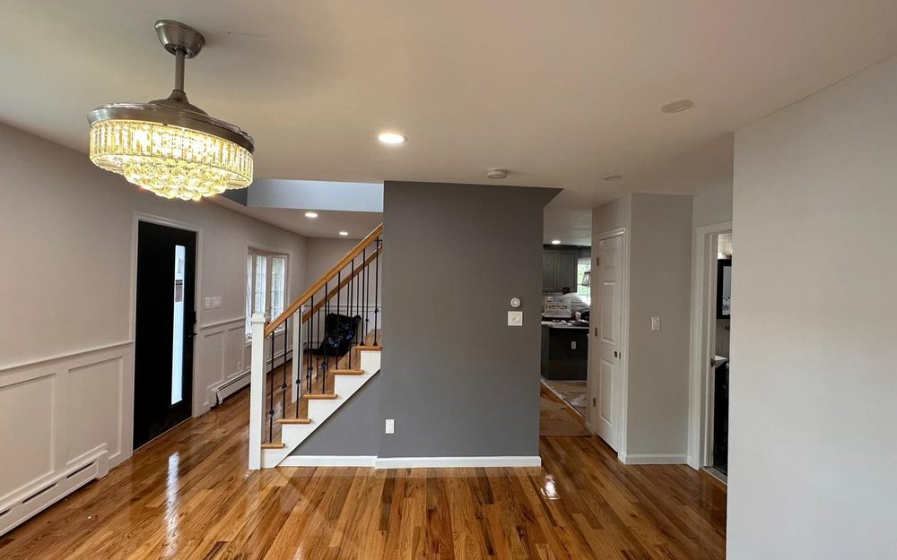 Entry with accent wall and trim painted